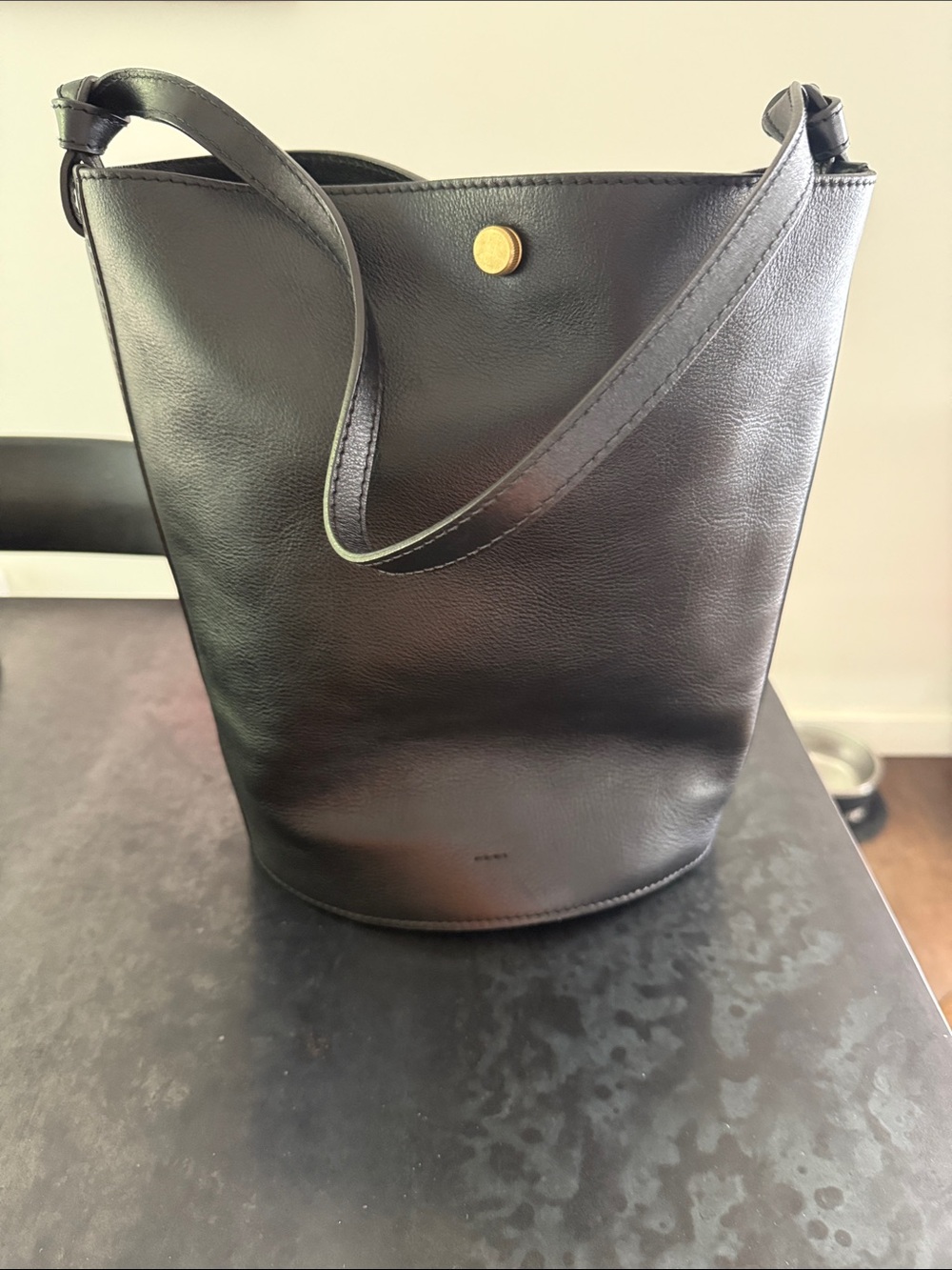 Black Leather Bucket Bag with Gold Accent